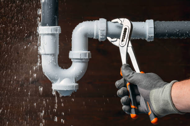 Professional Drain Cleaning technician working in Grinnell, IA